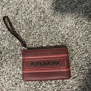 Coach pebbled leather wine wristlet